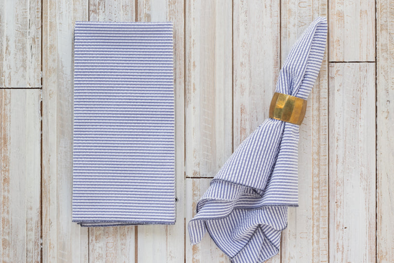 navy blue colored seersucker cloth napkins on table