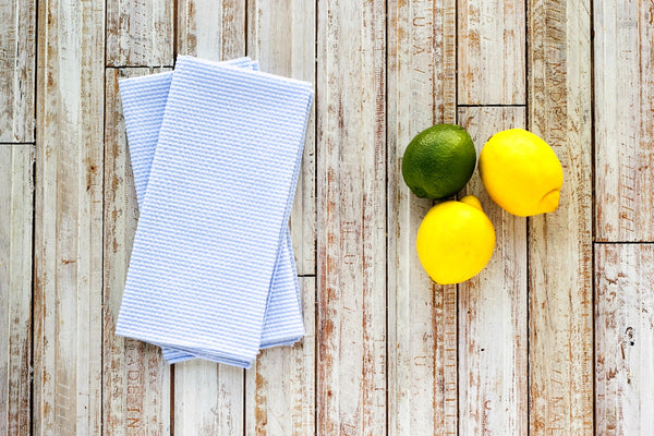 light blue colored seersucker cloth napkins on table