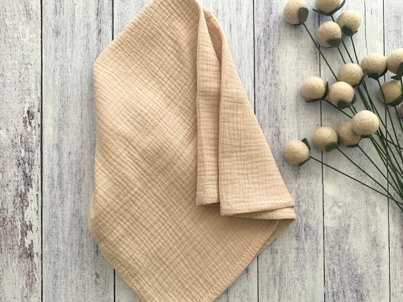 https://www.dotandarmy.com/cdn/shop/products/natural_gauze_cloth_napkin_800x.jpg?v=1681210590